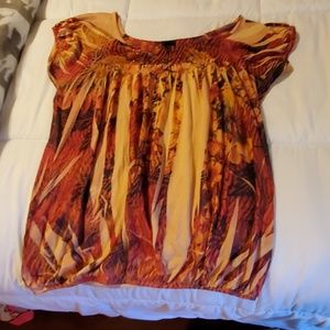 Gently-worn blouse with beads on neckline